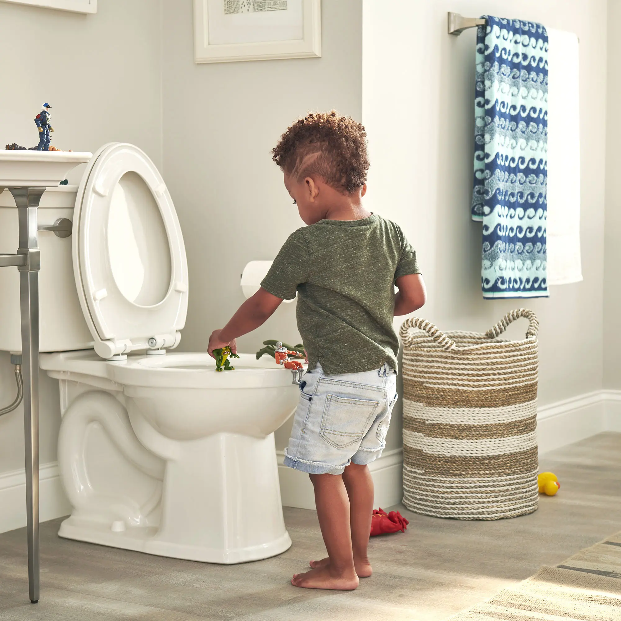 ActiClean® Two-Piece 1.28 gpf/4.8 Lpf Chair Height Elongated Toilet With Seat - Image 3