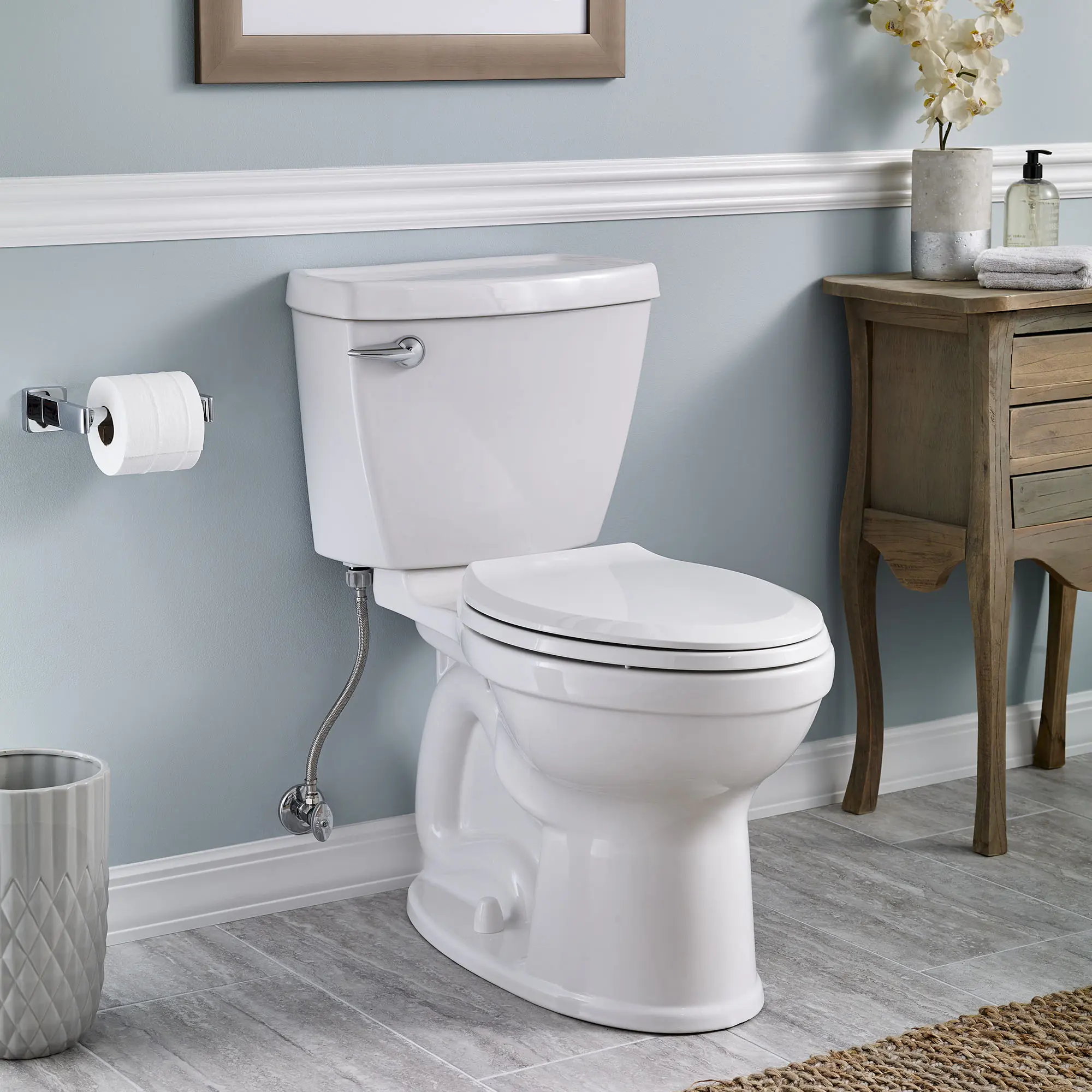 Champion 4 Two-Piece 1.28 gpf/4.8 Lpf Chair Height Elongated Toilet with Seat - Image 4