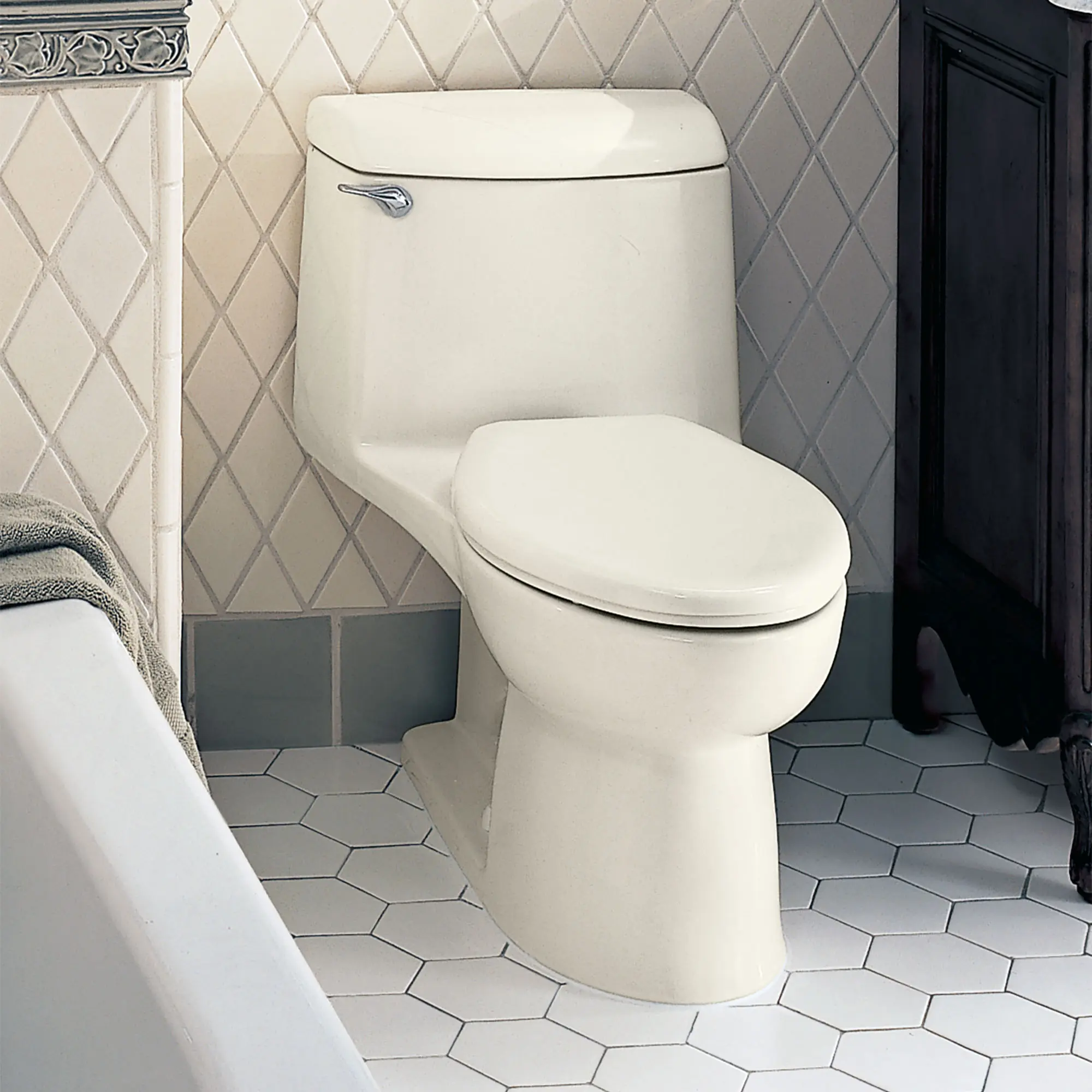 Champion® 4 One-Piece 1.6 gpf/6.0 Lpf Chair Height Elongated Toilet With Seat - Image 6