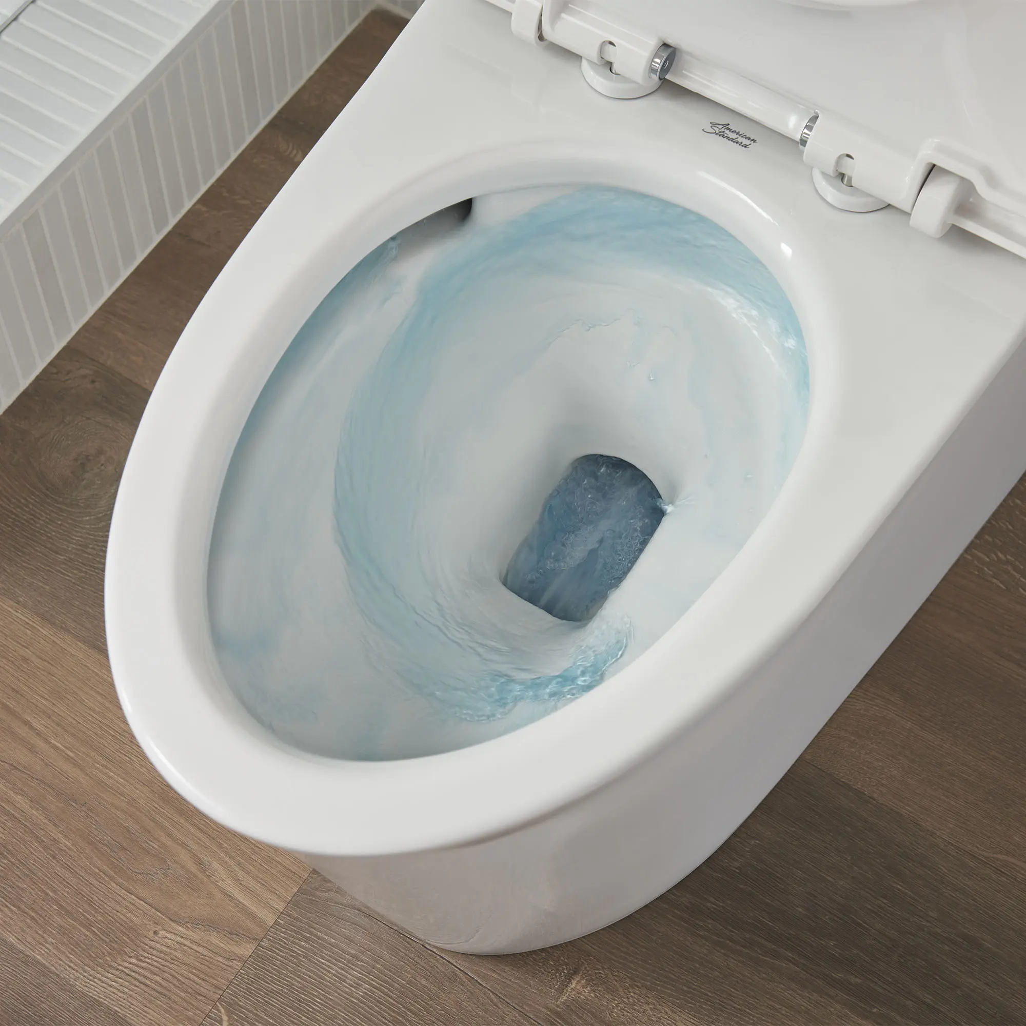 Studio® S One-Piece 1.0 gpf/3.8 Lpf Chair Height Elongated Toilet With Seat - Image 8