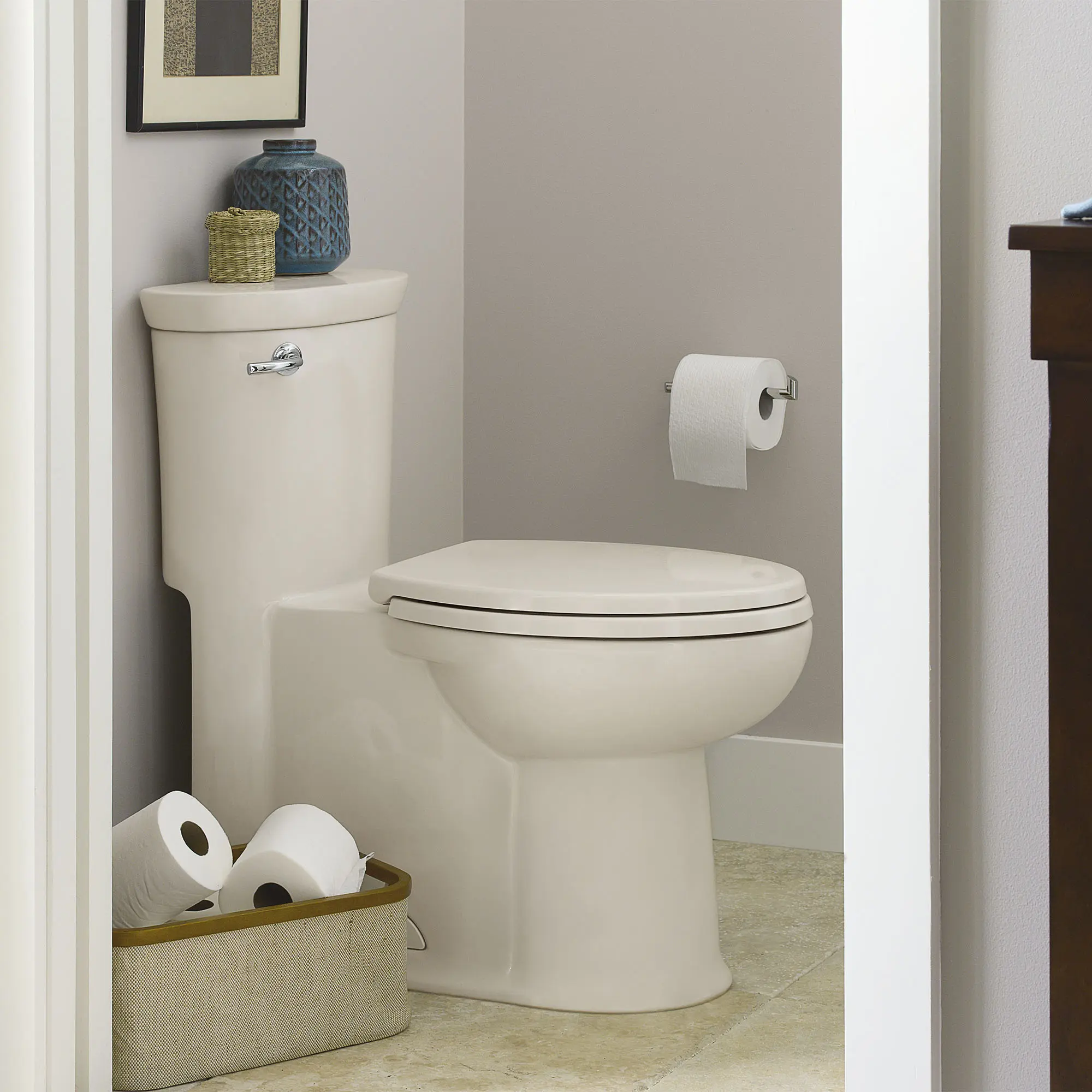 Tropic® One-Piece 1.28 gpf/4.8 Lpf Chair Height Elongated Toilet With Seat - Image 10