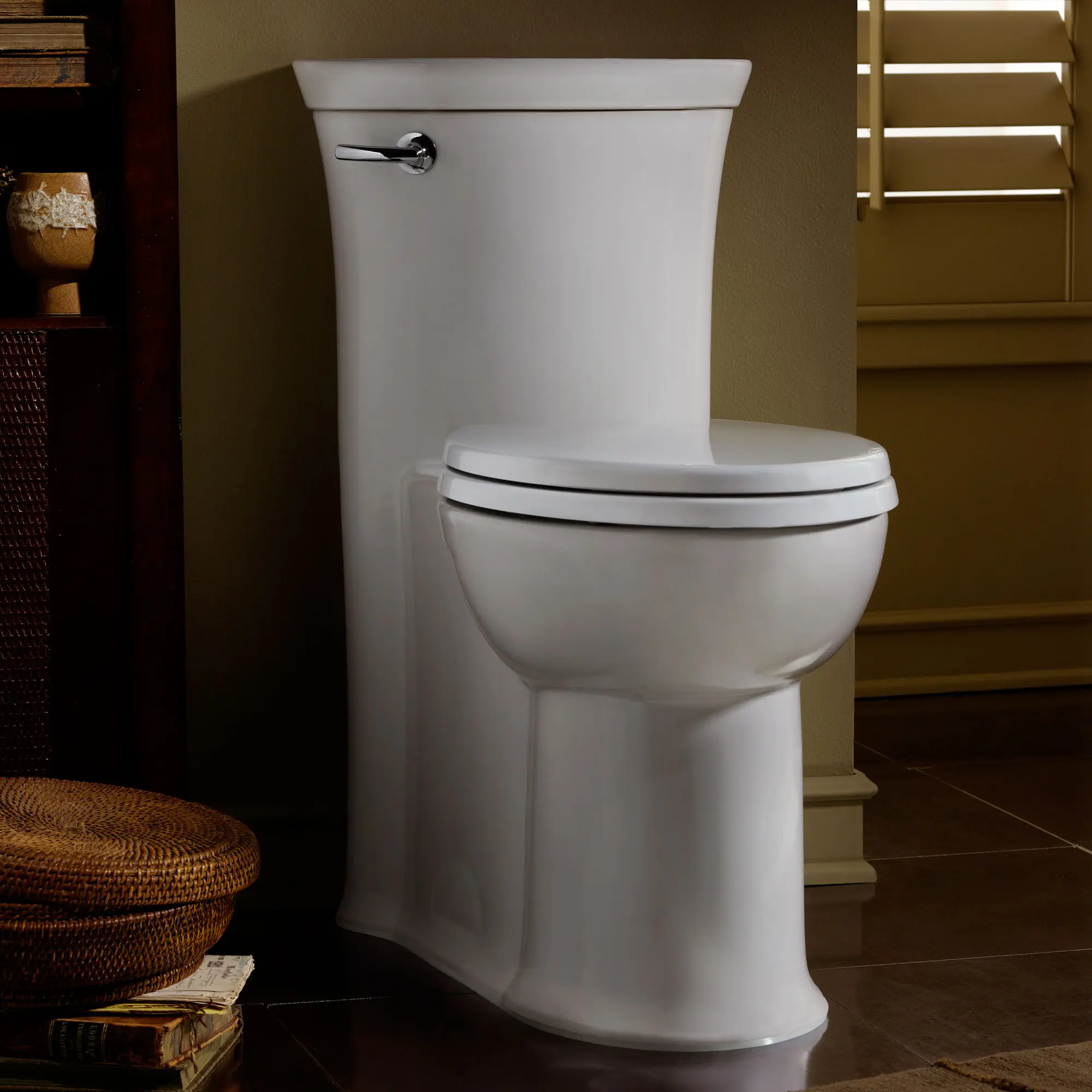 Tropic® One-Piece 1.28 gpf/4.8 Lpf Chair Height Elongated Toilet With Seat - Image 4
